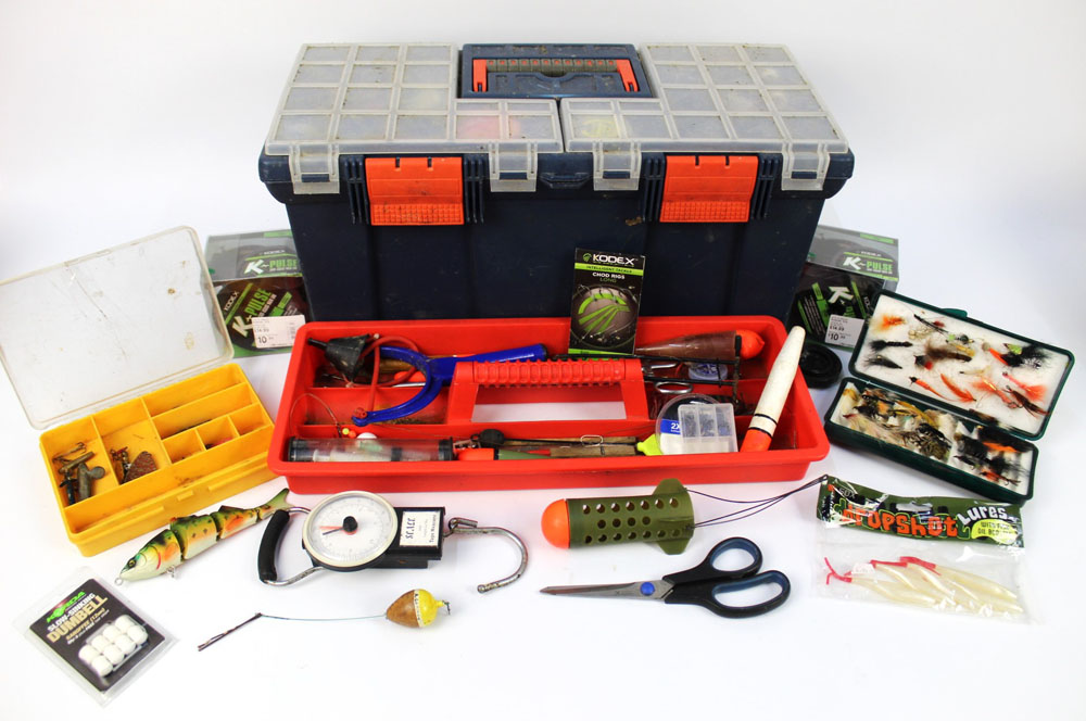 Three plastic tackle boxes, containing various plugs, Flying C's, spools of line etc.