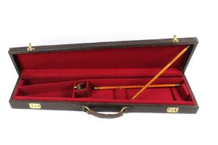 A leather shotgun motor case,