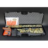 A Bettinsoli XTrail 12 bore over/under shotgun, wrapped in Vista camouflage, with 30" barrels,