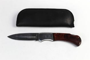 A massive cross cut folding knife, possibly an advertising piece, with a 7 1/2" blade,