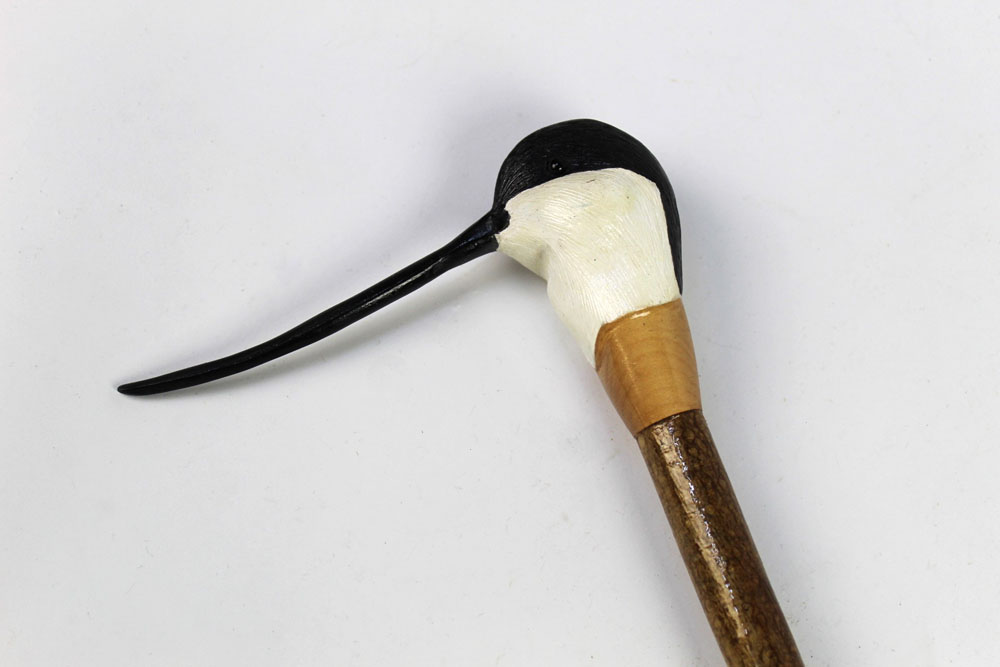 A walking stick with carved wooden handle, in the form of an Avocet, initialled to the rear RF.