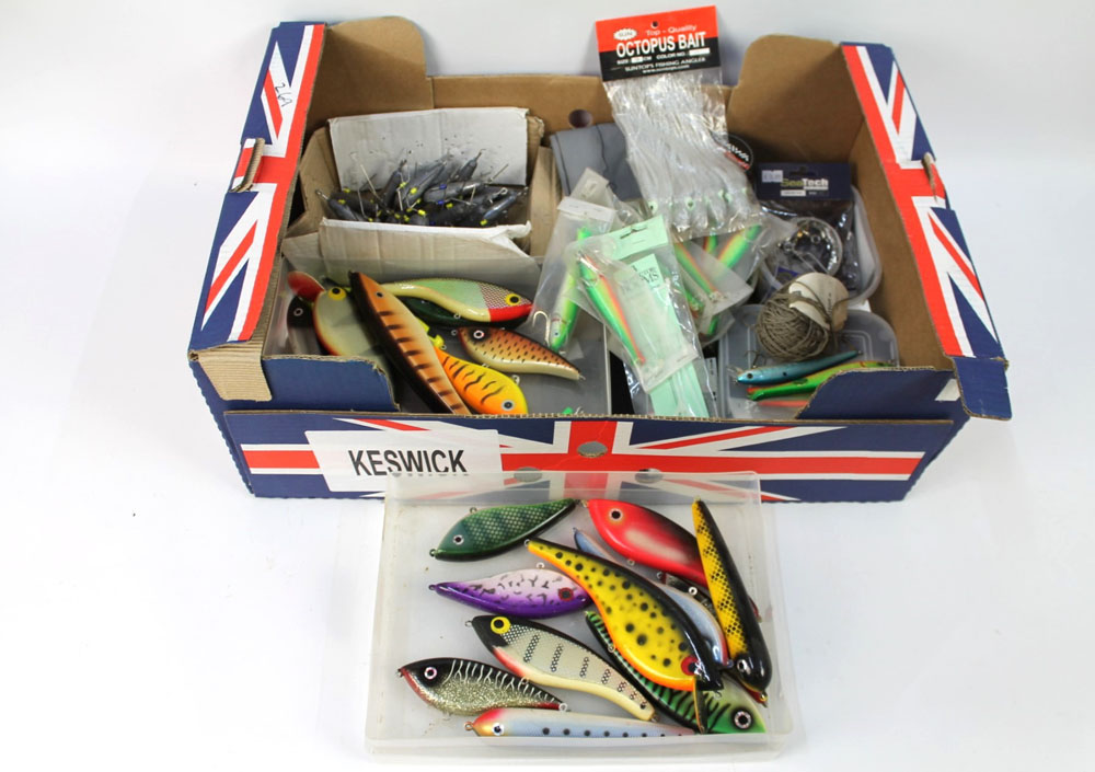 A box containing a quantity of sea fishing lures, weights, Octopus bait, shark wire trace etc.