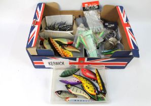 A box containing a quantity of sea fishing lures, weights, Octopus bait, shark wire trace etc.