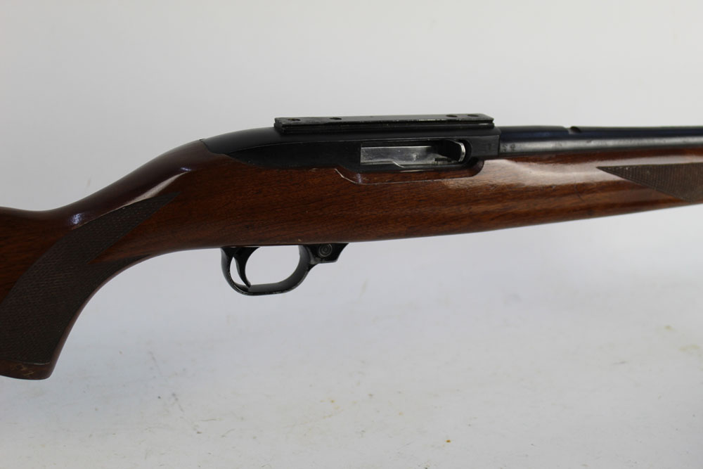 A Ruger 10/22 cal 22 LR semi automatic rifle, fitted with a sound moderator and leather sling,