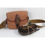 A Classic canvas and leather trimmed shotgun cartridge bag, together with a cartridge belt.