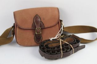 A Classic canvas and leather trimmed shotgun cartridge bag, together with a cartridge belt.