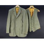 A Woodcock & Snipe of Cumbria Tweed sports jacket and matching waistcoat,