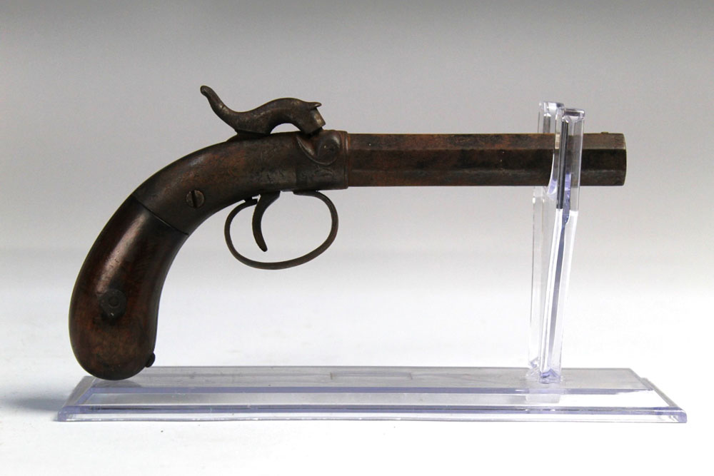 A Victorian percussion pistol,