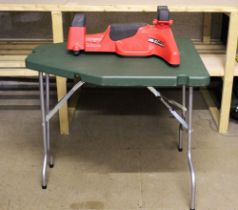 An MTM Case-Gard folding shooting table, together with a Predator shooting rest.