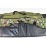 Three rifle slips, to include a camouflage Range bag.