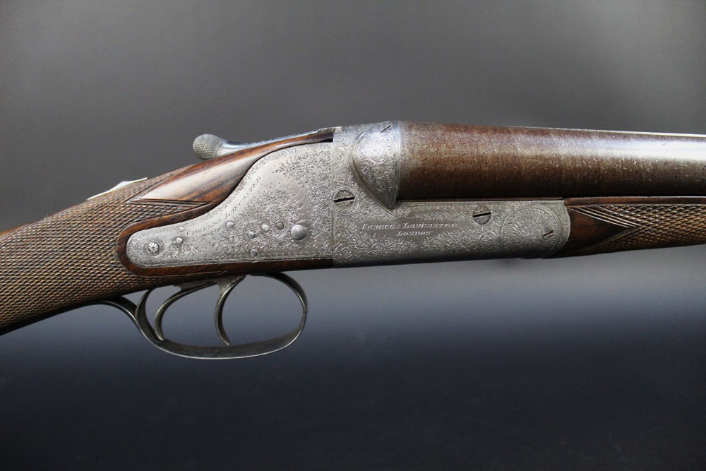 Charles Lancaster a 12 bore Patent hammerless ejector gun, with 30" Damascus barrels, - Image 9 of 16