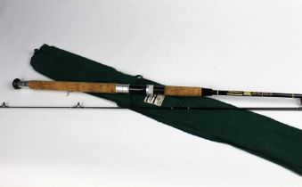 A Shakespeare Ugly Stik spinning rod, in two sections 7'.