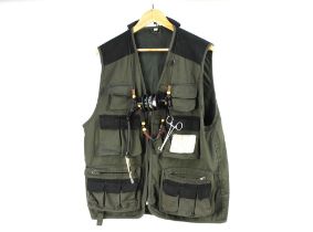 A Fladen fly fishing waistcoat Size L, together with a lanyard with forceps, scissors,