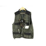 A Fladen fly fishing waistcoat Size L, together with a lanyard with forceps, scissors,