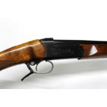 A Baikal 410 single barrelled shotgun, with a 26 3/4" barrel, full choke, 76 mm chamber,