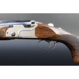 WITHDRAWN - A Beretta DT11 12 bore over/under shotgun, with 28 3/4" multi choke barrels,