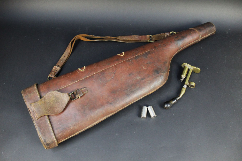 A vintage leg of mutton shotgun case,