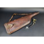 A vintage leg of mutton shotgun case,