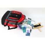 A rucksack containing a large quantity of Fladen sea fishing feathers, squid bait fishing lures etc.