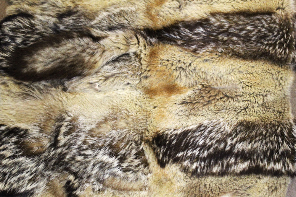 Taxidermy - A Jackal rug or throw, 18 skins in total on brown felt backing. 218 cm x 149 cm. - Image 2 of 2