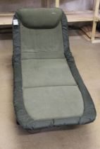 An NGT Classic bed chair with recliner.