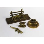 Four pieces of brass - a monkey (possibly a car mascot) height 5 cm, together with fox letter rack,