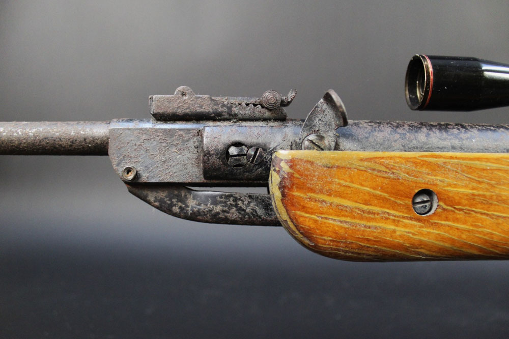 A cal 22 break barrel air rifle, possibly Chinese, fitted with a telescopic sight (scope), - Image 7 of 10