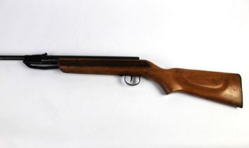 An air rifle, stamped to the side Foreign cal 22 break barrel. Serial No. 55709.