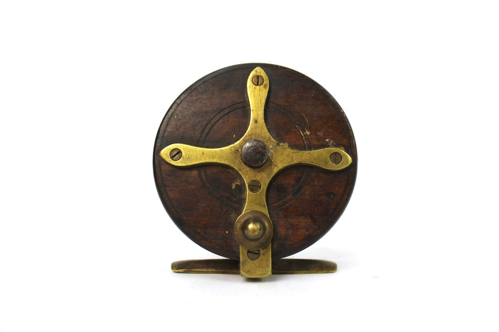 Allcocks & Co Makers Redditch, a brass and wooden star back reel, +/- 3 1/2". - Image 2 of 5