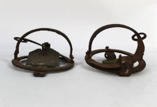 Two pole traps, both unnamed, the largest diameter 14.5 cm, the smallest diameter 13 cm.