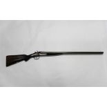 An English side by side hammer shotgun, with 30" Damascus barrels, nitro proof, 2 1/2" chambers,