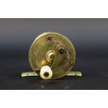 An Ustonson brass pole winch fishing reel, marked to the side Ustonson maker to His Majesty,