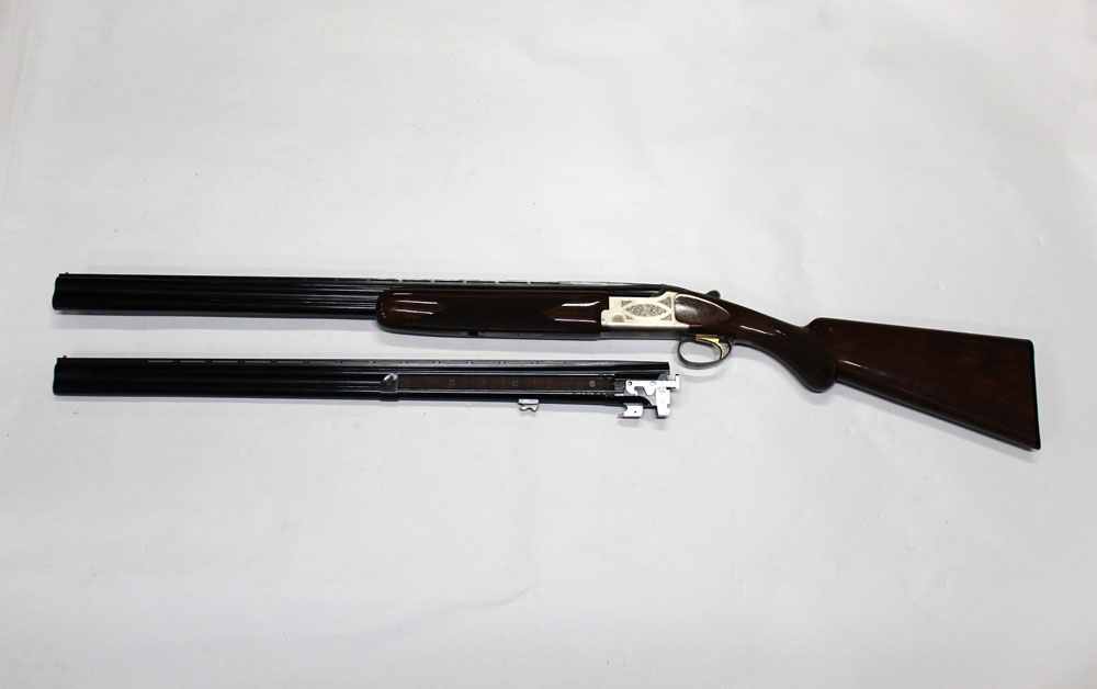 A Browning Citori shotgun, made in Japan by Maroku with two sets of barrels, the first 20 bore, - Image 2 of 5