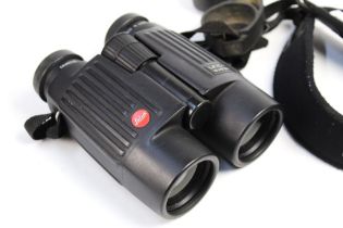 A pair of Leica Trinovid 10 x 42 BN binoculars, with pouch. Serial No. 1535754.