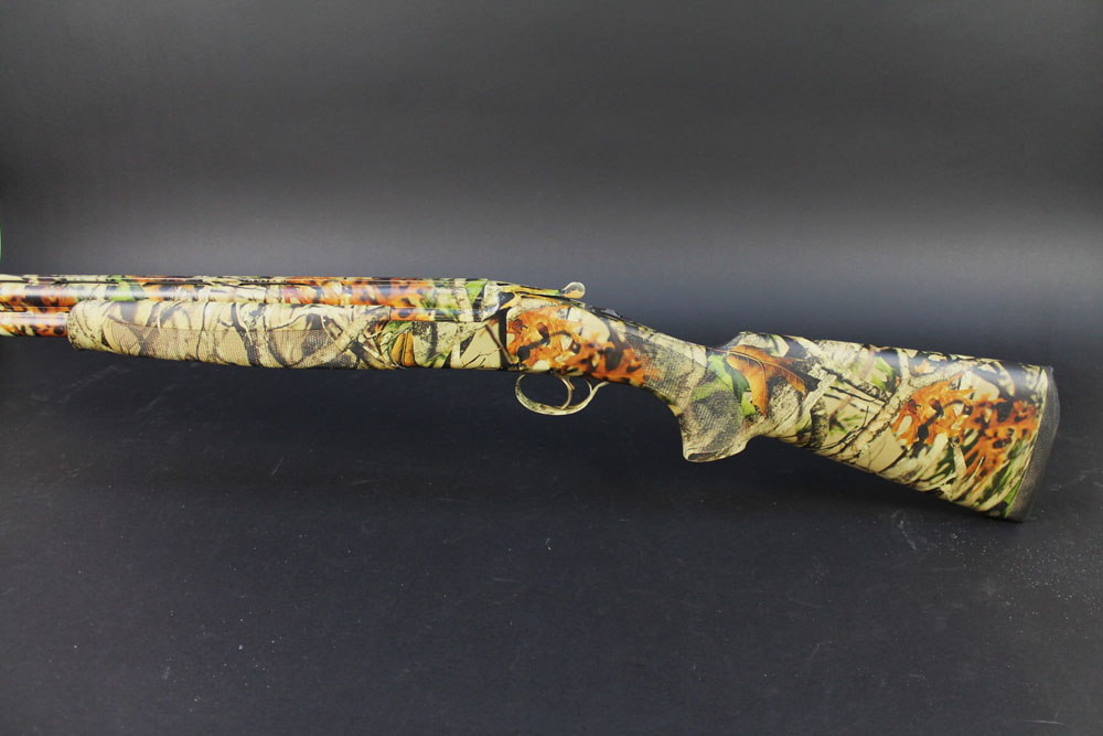 A Bettinsoli XTrail 12 bore over/under shotgun, wrapped in Vista camouflage, with 30" barrels, - Image 6 of 11