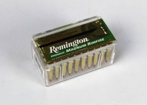 A box of fifty Remington 17 HMR 17 grain Acutip-V boat tail rifle cartridges.