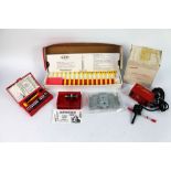 A set of Lyman 375 H & H Magnum reloading kit, a Vibrashine electric powder trickler,