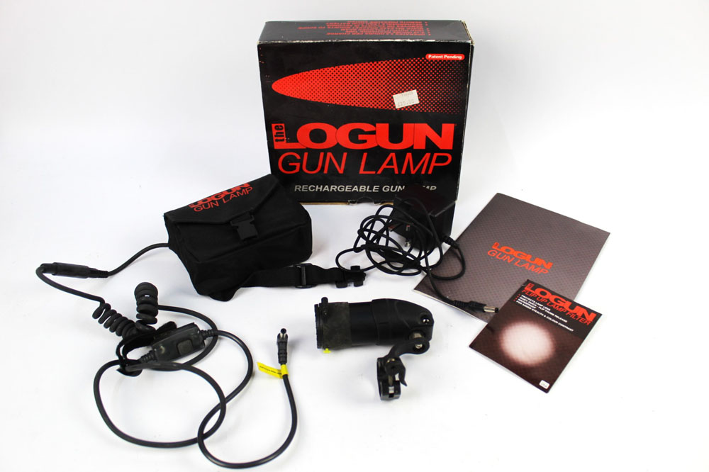 A Logan gun lamp, with battery, charger etc.