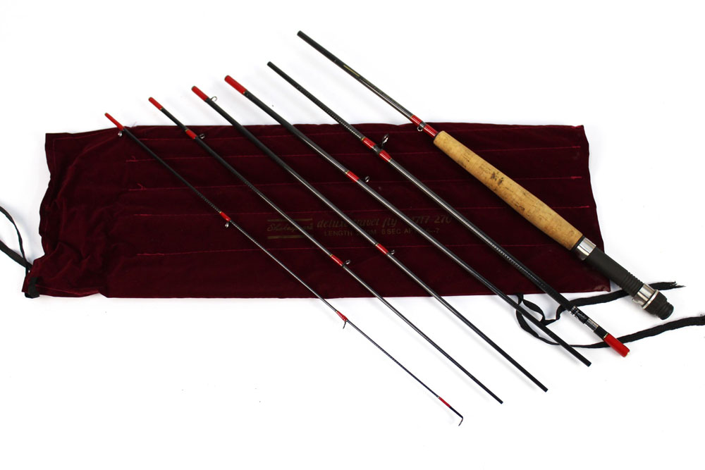 A Shakespeare Deluxe travel fly rod, in six sections, 2.7 m line 6-7.