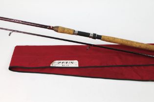 An Abu Garcia Zeuss bass rod, in two sections 12'.