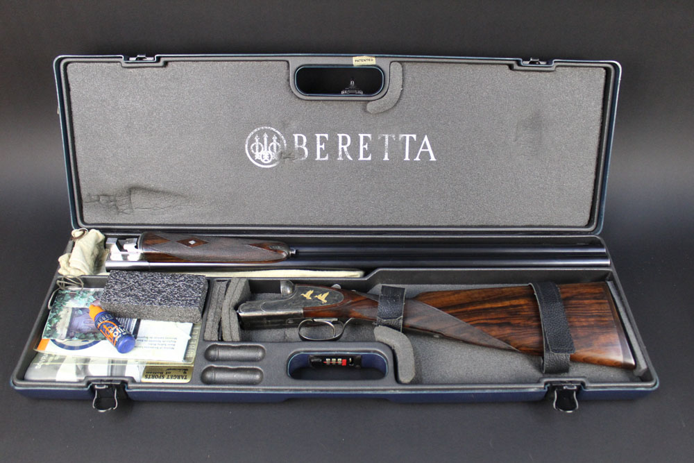 A Beretta 471 EL 12 bore side by side shotgun, with 28" barrels, 3" chambers, top lever,