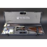 A Beretta 471 EL 12 bore side by side shotgun, with 28" barrels, 3" chambers, top lever,