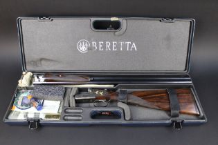 A Beretta 471 EL 12 bore side by side shotgun, with 28" barrels, 3" chambers, top lever,