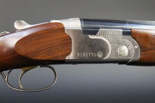Beretta 686 Onyx 12 bore over/under shotgun with 28" multi choke barrels, 76 mm chambers, ejector,