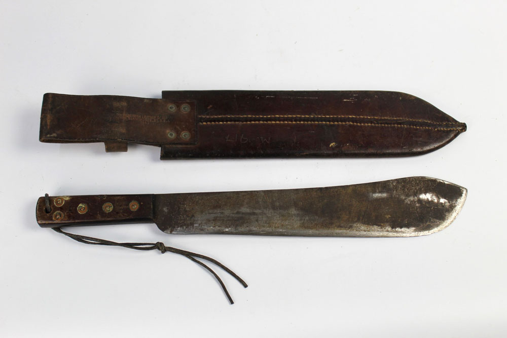 A World War 2 machete, the blade stamped with a broad arrow and JJB dated 1942, - Image 2 of 2