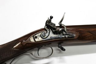 A Pedersoli Mortimer cal 54 black powder flintlock rifle, with a 35 1/2" barrel,