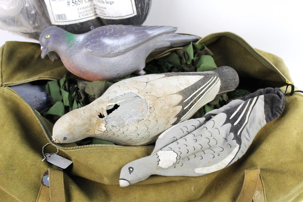 A vintage canvas duffle bag, containing a pigeon hide net, various crow and pigeon decoys. - Image 2 of 2