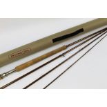 A Reddington Red Fly salmon fly rod, in four sections, 13' line 8, with rod tube.