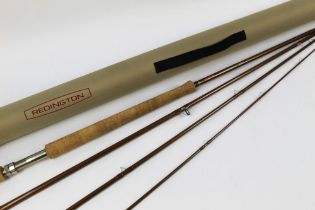 A Reddington Red Fly salmon fly rod, in four sections, 13' line 8, with rod tube.