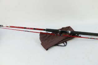 An Abu Garcia Four Start Atlantic spinning rod, in two sections 8' 6".